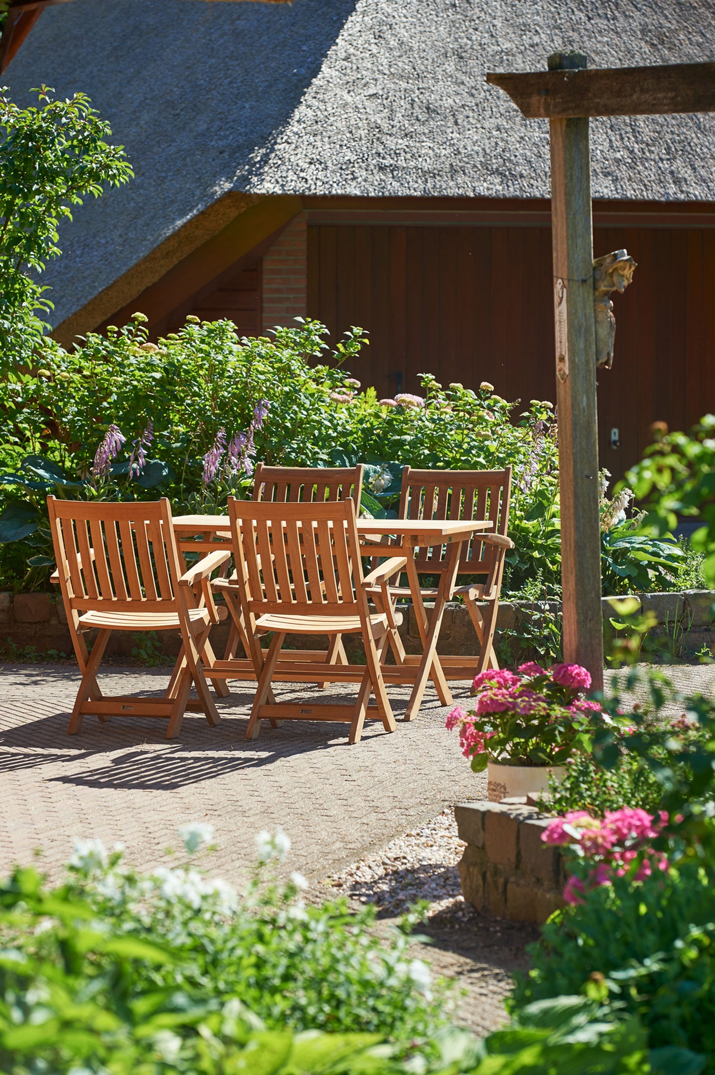 Traditional Teak Alexia folding armchair